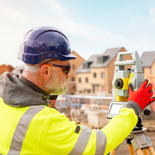 Land Surveyor Setting Up